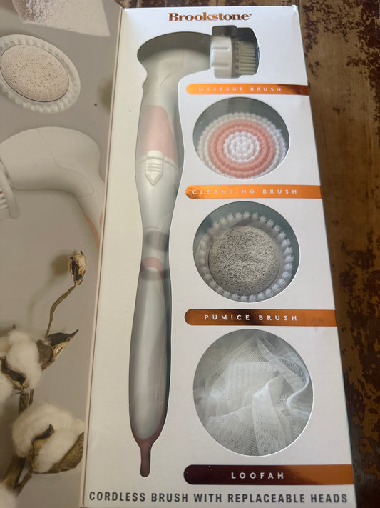 Brookstone face and body electric brush set